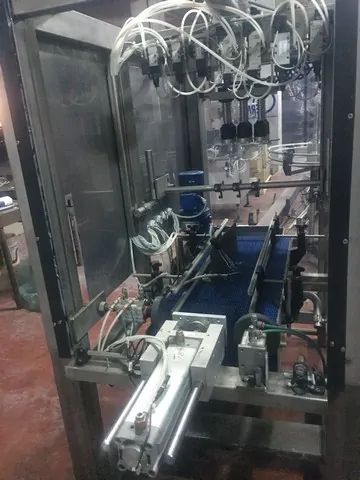 Linea di imbottigliamento per Olio 2.500 bph Usata